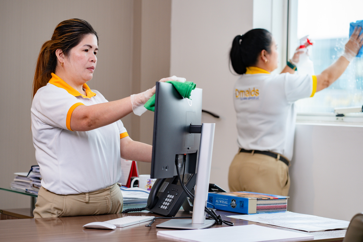DMAIDS team cleaning a modern UAE office